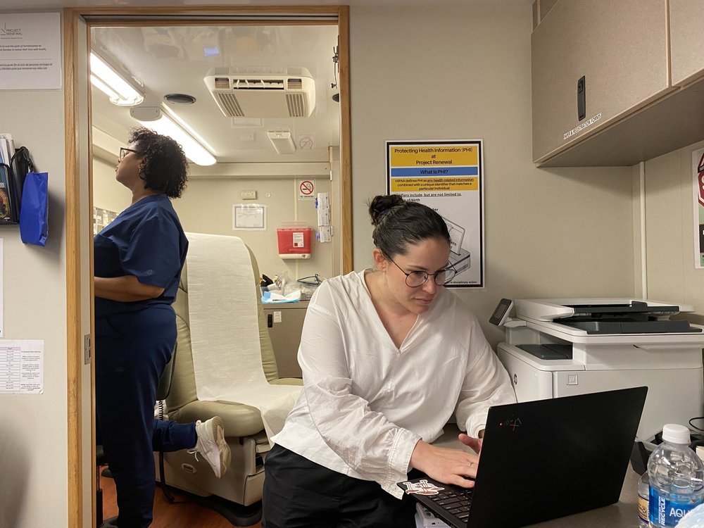 Psychiatrist Rachael Holbreich works inside Project Renewal’s mobile clinic on a recent Monday morning.