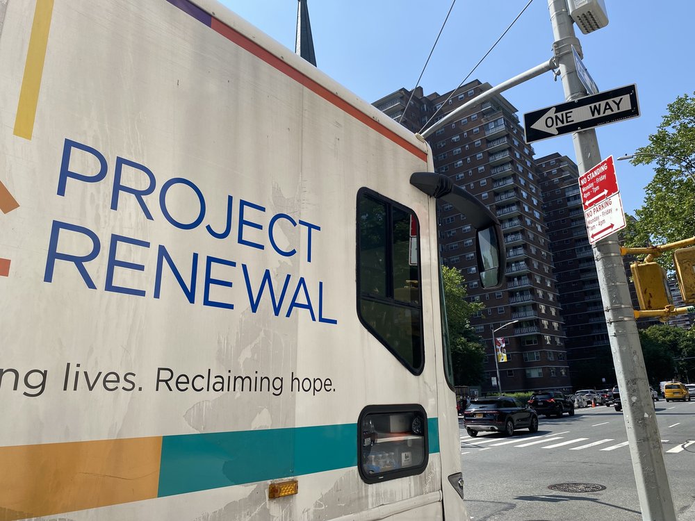 Project Renewal’s mobile clinic parked outside Holy Apostles Soup Kitchen offering basic medical services and mental health services for homeless and other individuals.