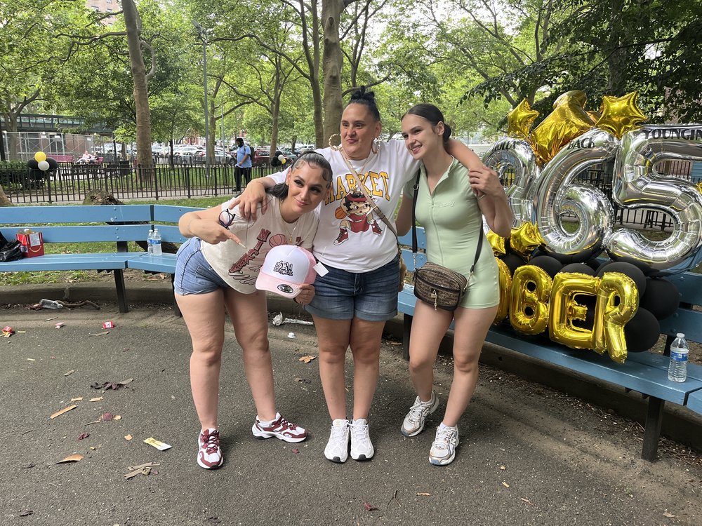 Kim Quidone, center, with her daughters at her party in Bushwick celebrating a year of sobriety.