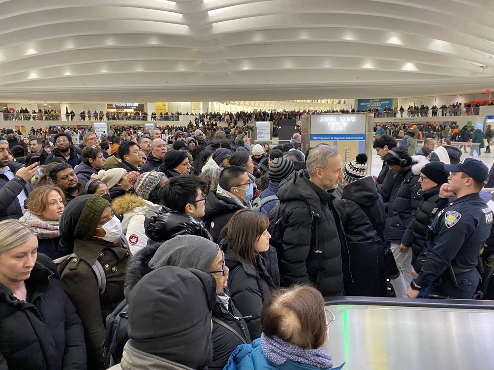 Commuters are held as they wait to board PATH trains on Thursday, Jan. 23, 2025.