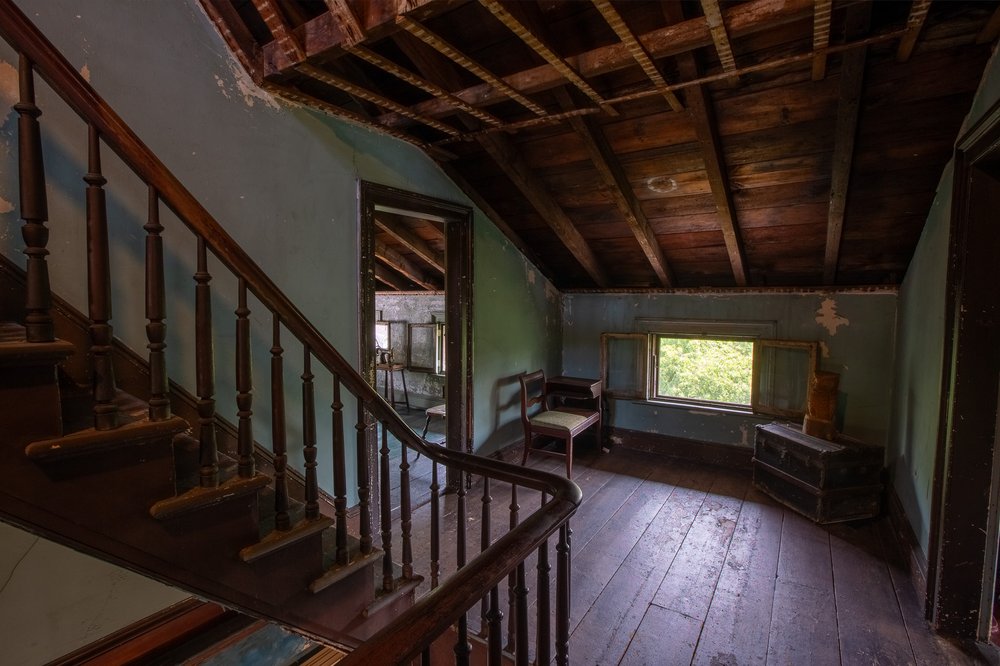The third floor has additional bedrooms that serve as photo backdrops.