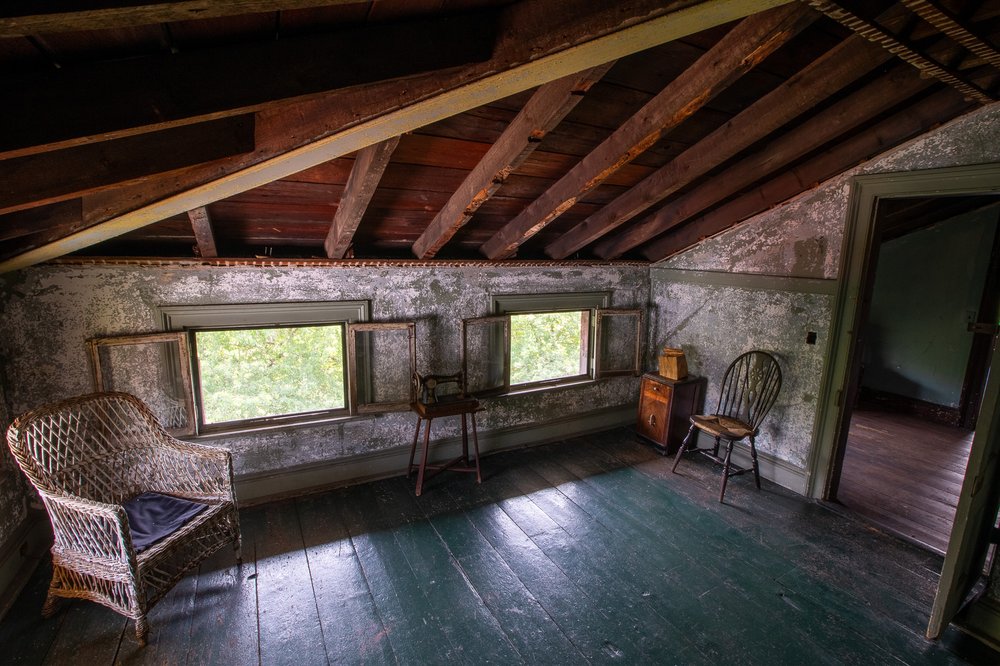The third floor has additional bedrooms that serve as photo backdrops