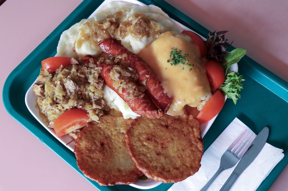 A plate of food on a tray.