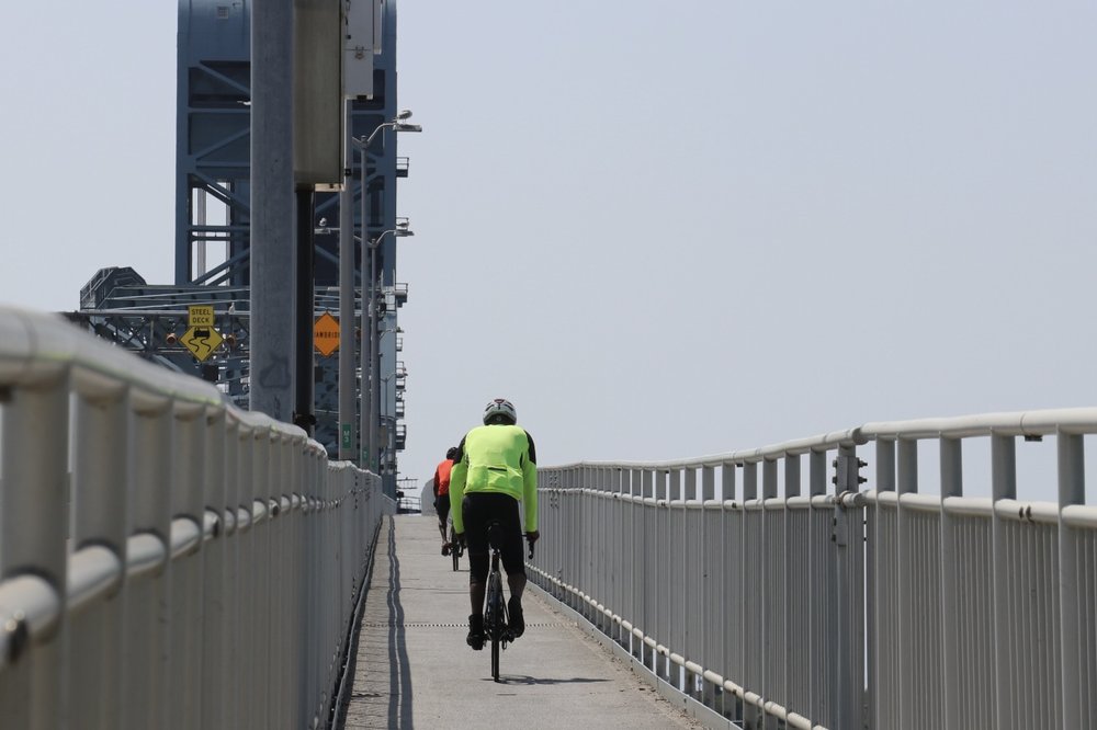 A cyclist rides across the Marine Parkway Bridge on Thursday.