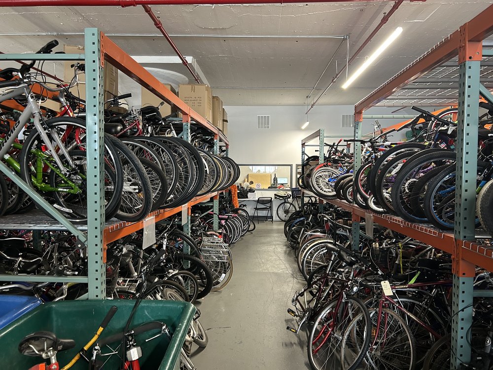 Citi Bike bikes fill a large space in Industry City in Brooklyn.