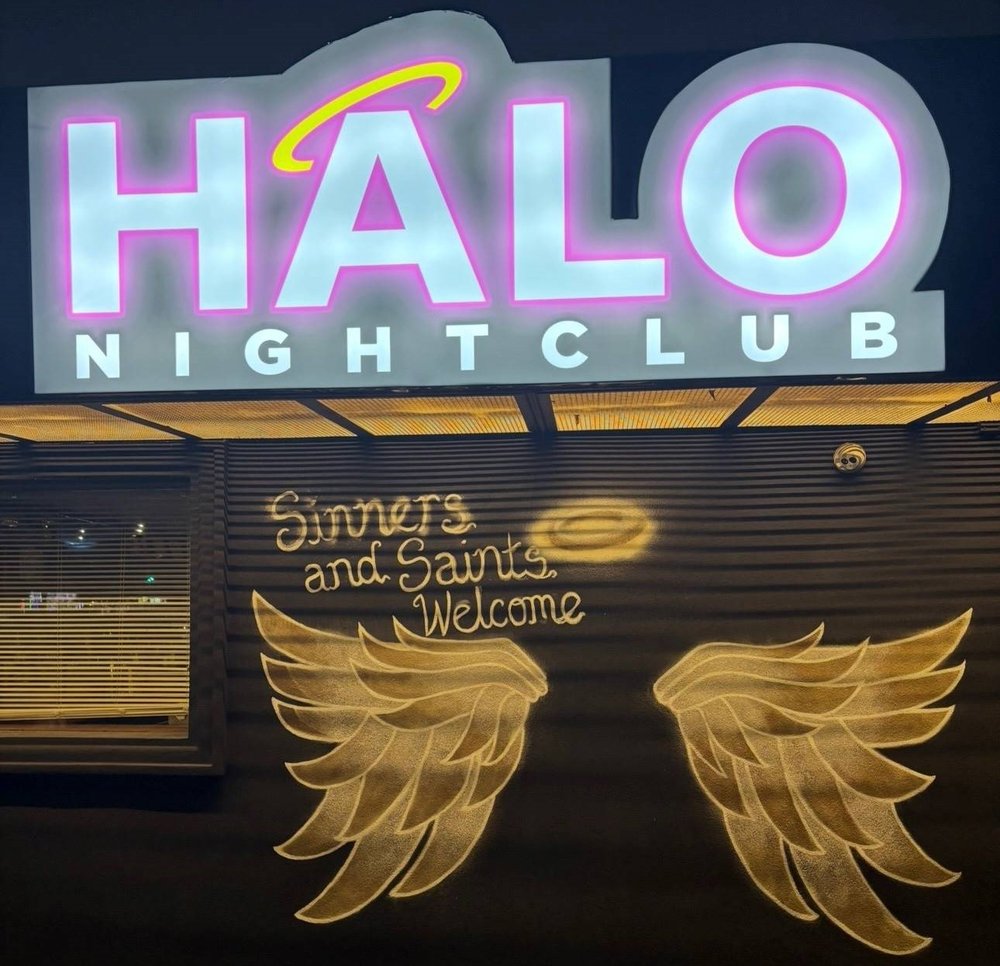 A sign that says "HALO" with wings underneath.