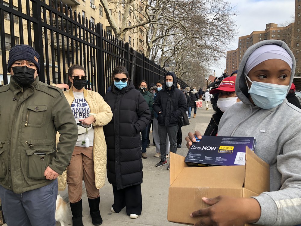 New Yorkers line up for free at-home COVID-19 test kits ahead of Christmas at a pop-up location on the Lower East Side, Dec. 23, 2021