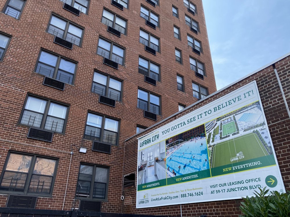 Outside of LeFrak City in Queens, where a sign boasts that the complex has a park and tenants have pool access.