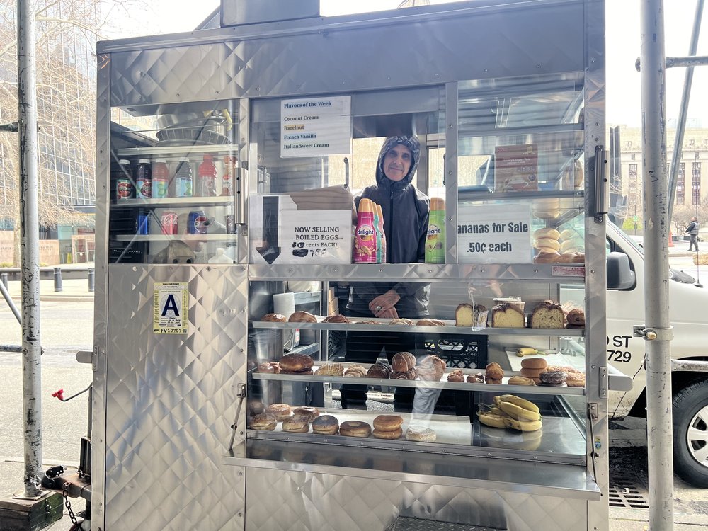 A photo of Wahed Karimi, a food cart vendor.