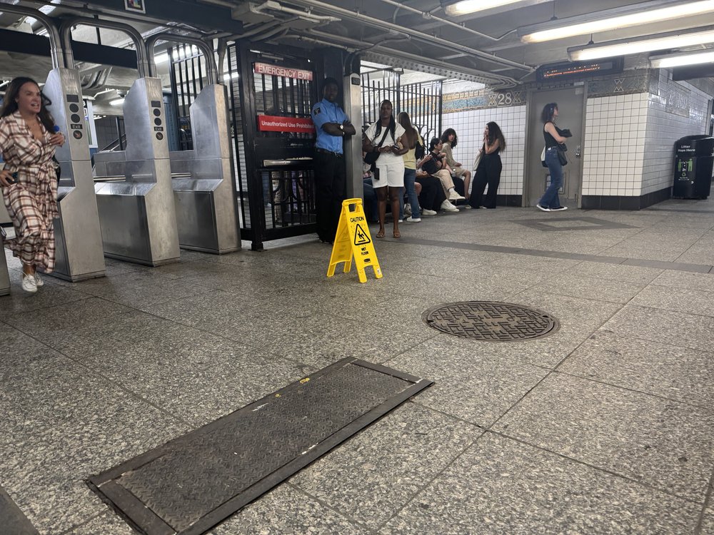 A photo of a manhole at the 28th Street station that gushed like a geyser.