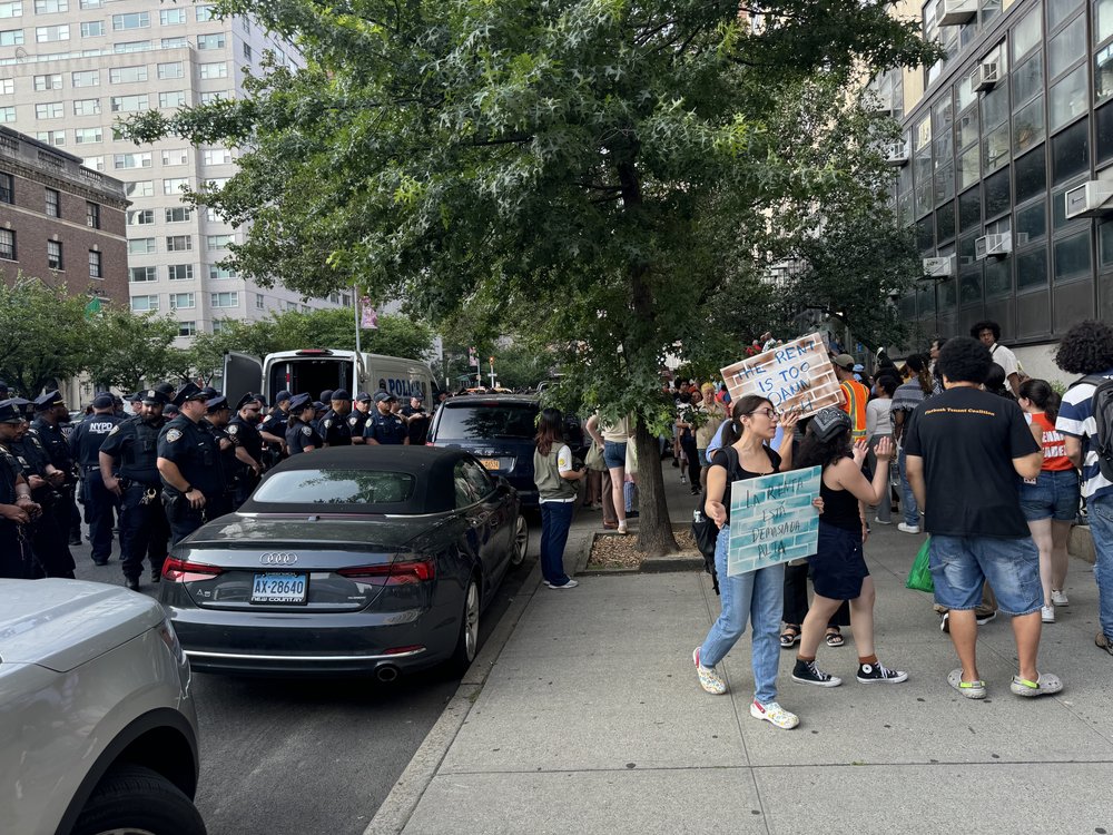 Demonstrators rally outside of Hunter College, where the Rent Guidelines Board met to vote for a rent increase.