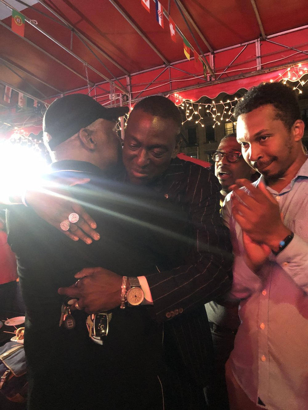 A photo of Yusef Salaam embracing Keith Wright, his political mentor.