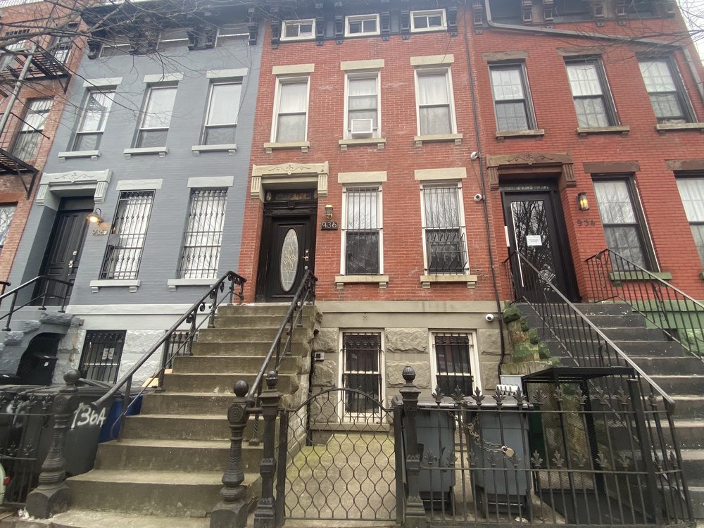 A brick townhouse in Brooklyn.