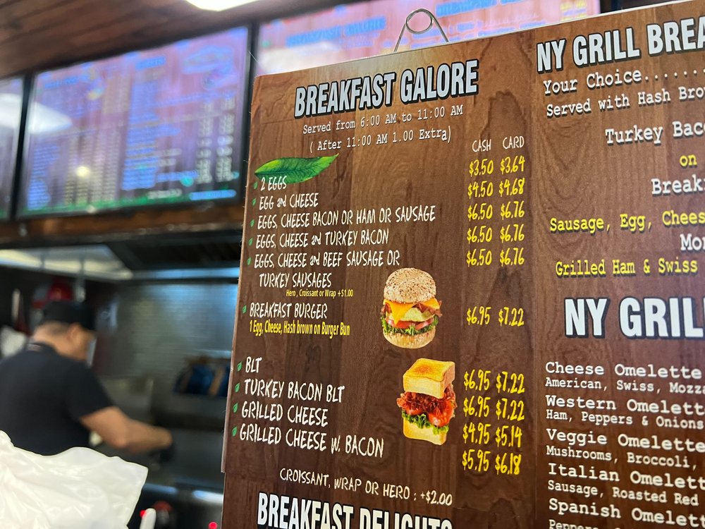 A menu of deli sandwich prices.
