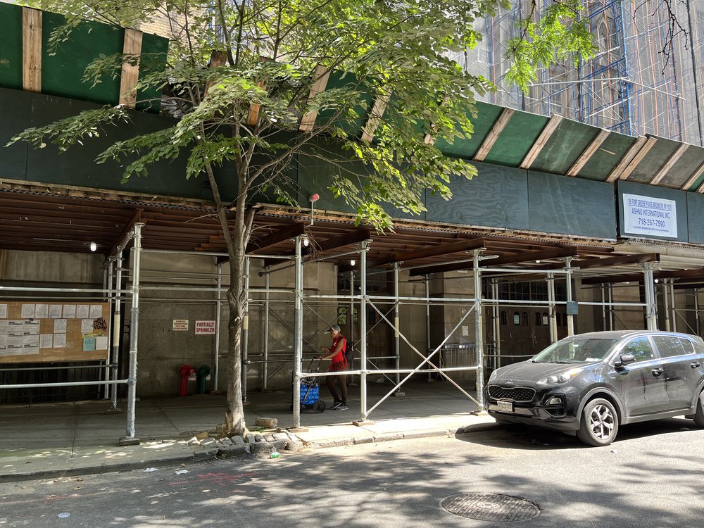 A sidewalk shed near Brooklyn Tech.