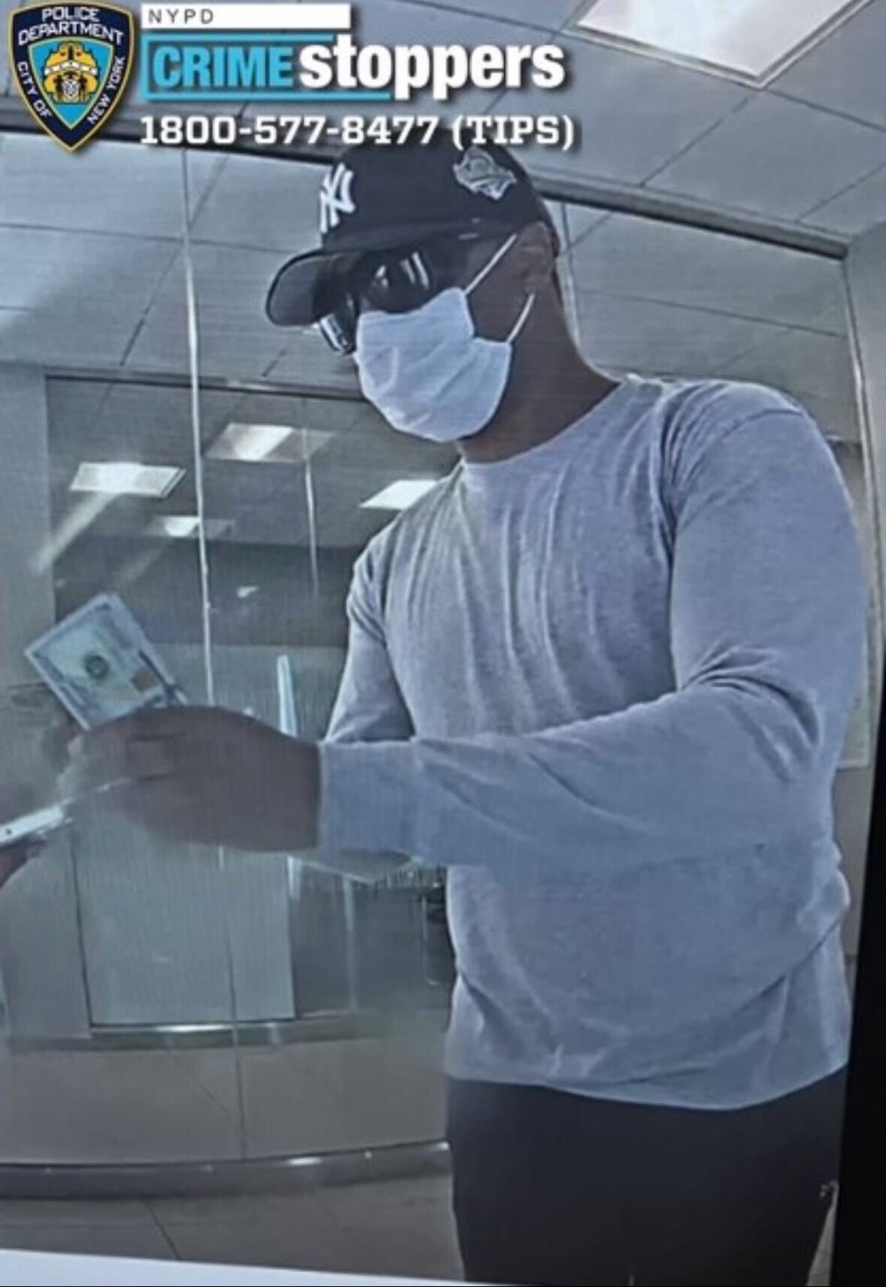 The man police are searching for in connection with the fraudulent check scheme.