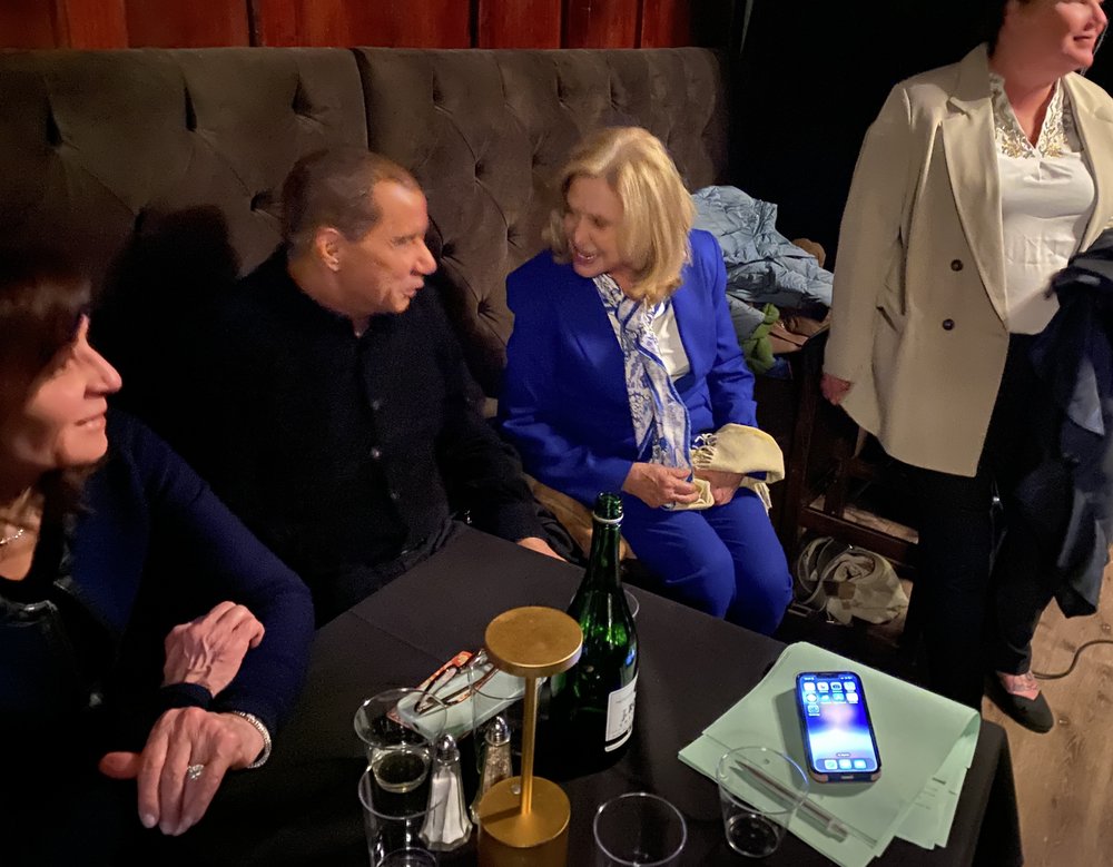 Former Gov. David Patterson chats with former Rep. Carolyn Maloney at The War Room in Albany this week.