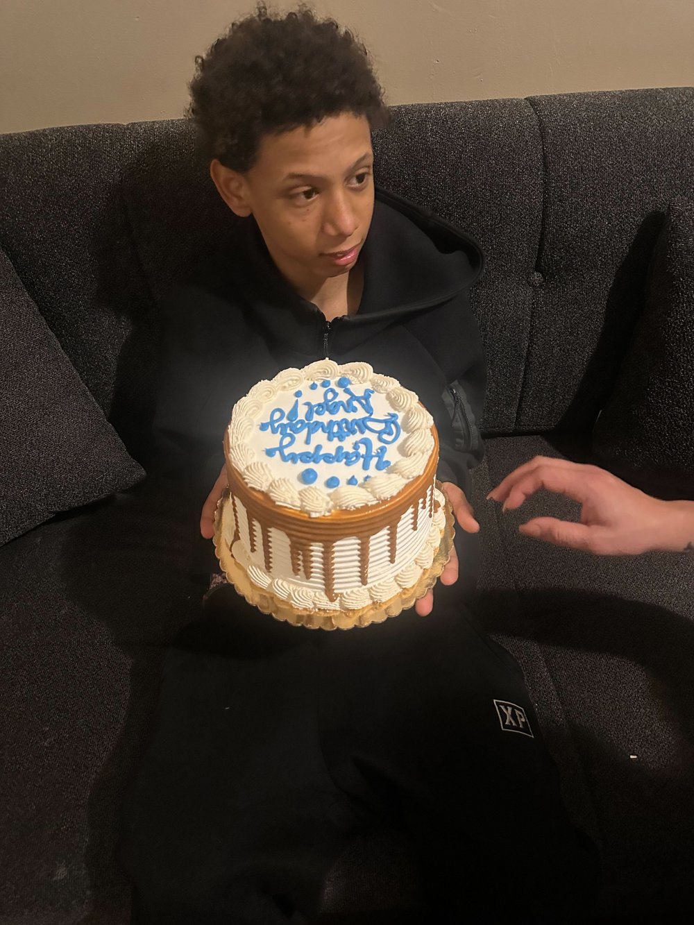 A photo of slain teen Angel Mendoza with a birthday cake.