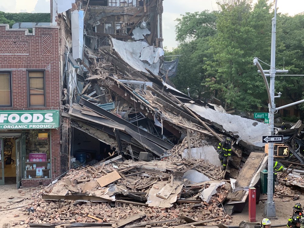 Photographs of the collapsed building at 348 Court Street and the FDNY response.