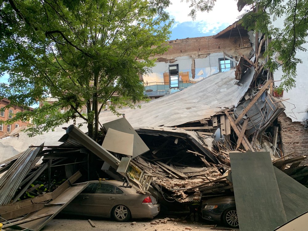 Photographs of the collapsed building at 348 Court Street and the FDNY response.