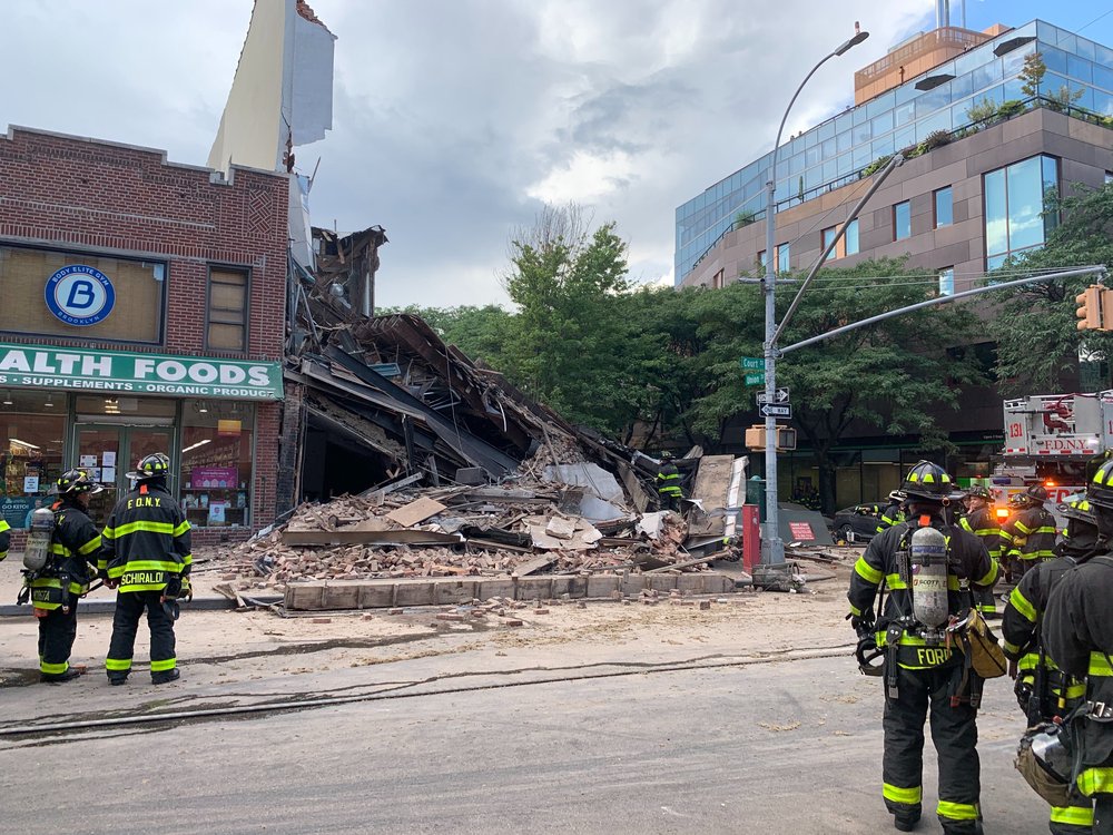 Photographs of the collapsed building at 348 Court Street and the FDNY response.