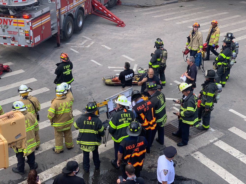 Photographs of the collapsed building at 348 Court Street and the FDNY response.