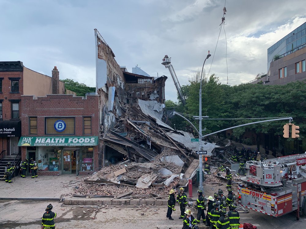 Photographs of the collapsed building at 348 Court Street and the FDNY response.