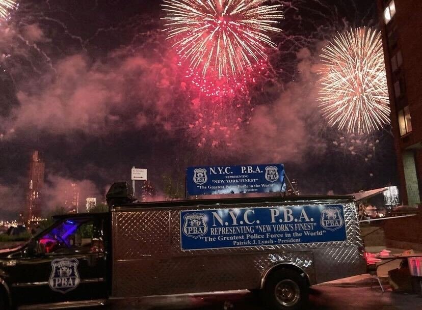 A photo of a PBA van at a private fireworks viewing party for the NYPD