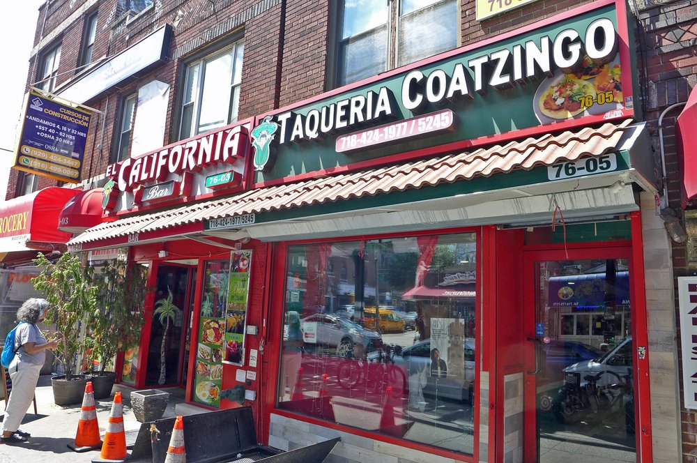 The exterior of a taco shop.