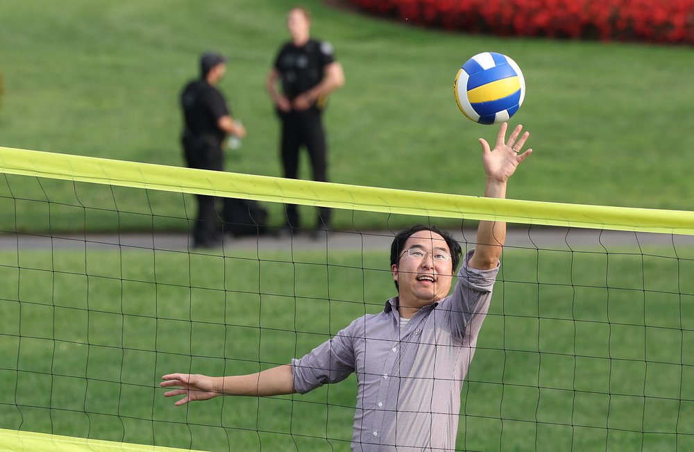 A photo of Rep. Andy Kim playing volleyball