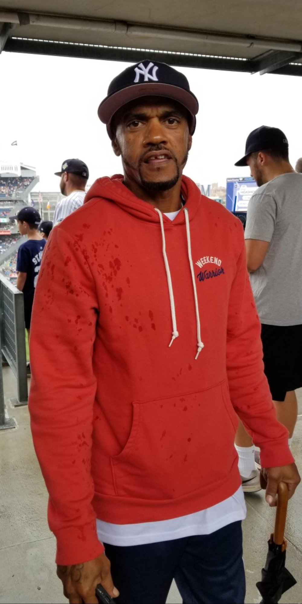 Construction worker Linden Samuel, in a red hoodie and Yankees hat, was killed last month while working in The Bronx.