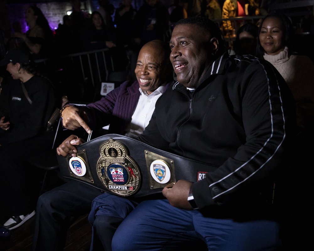 A photo of former top cop Jeffrey Maddrey with Mayor Eric Adams at sporting event.