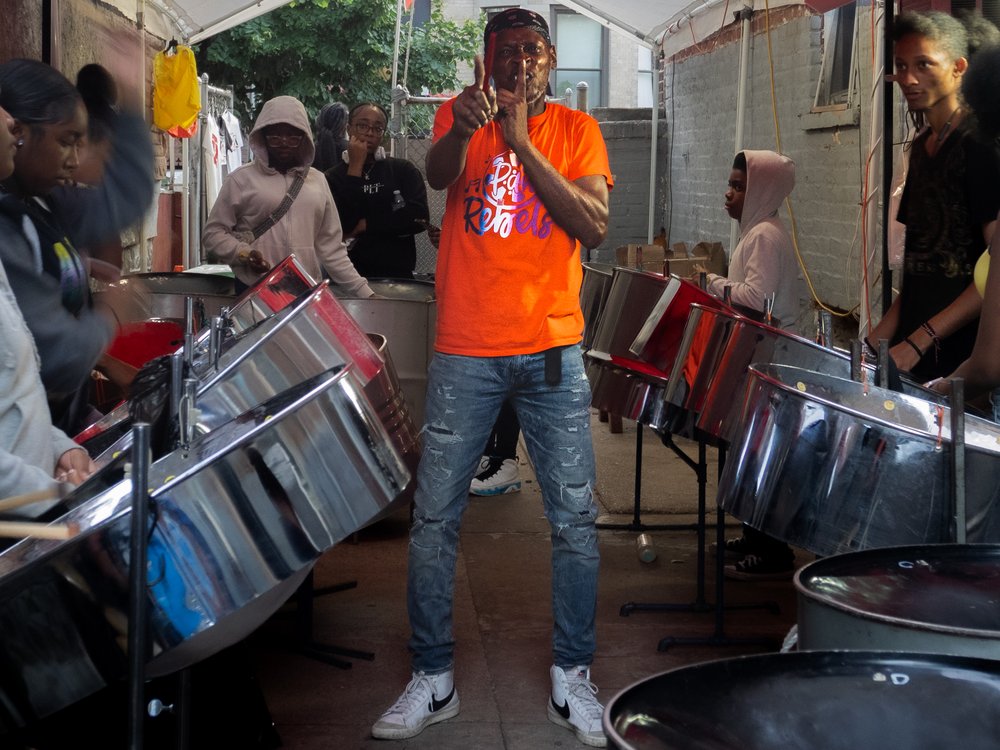 A photo of a steel pan band rehearsing before Monday's parade.
