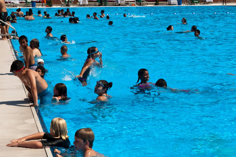 Children play in a pool.