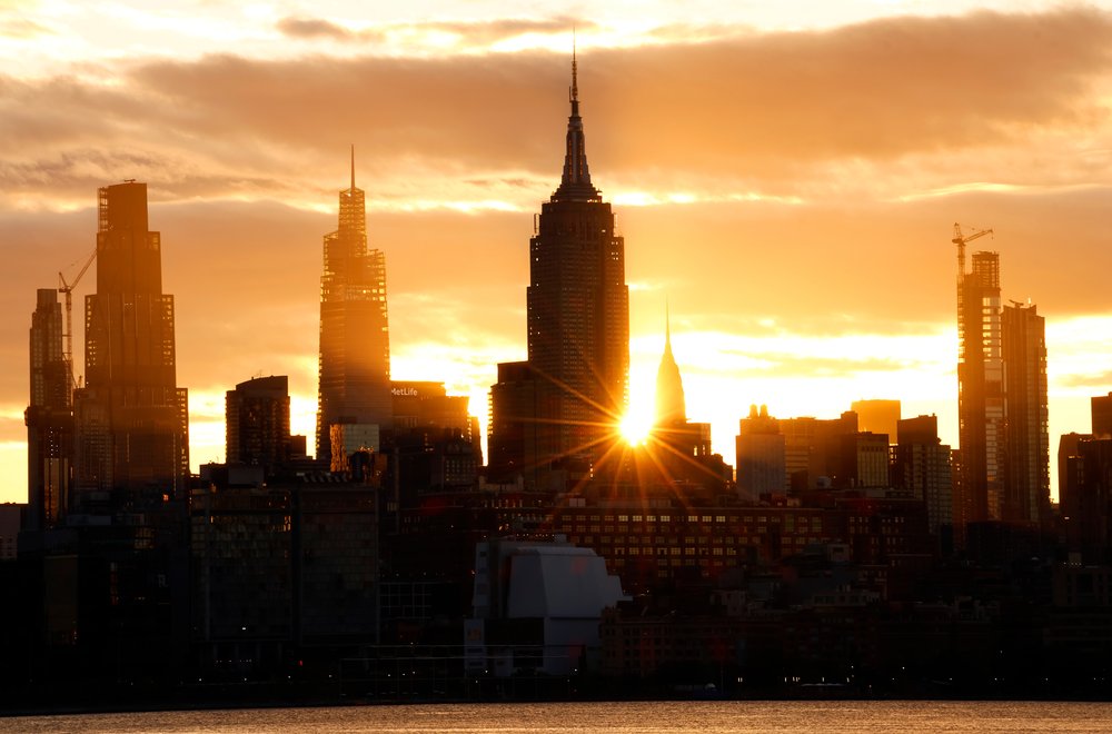 An image of the Manhattan skyline at sunrise