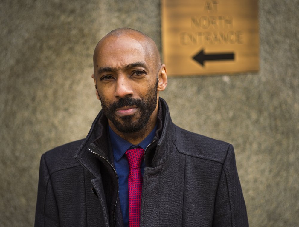 A portrait of public defender Daudi Justin.