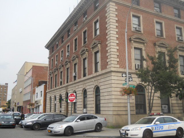 The NYPD's 103rd precinct house, where a man and woman with gunshot wounds pulled up in a car late Tuesday night, according to police