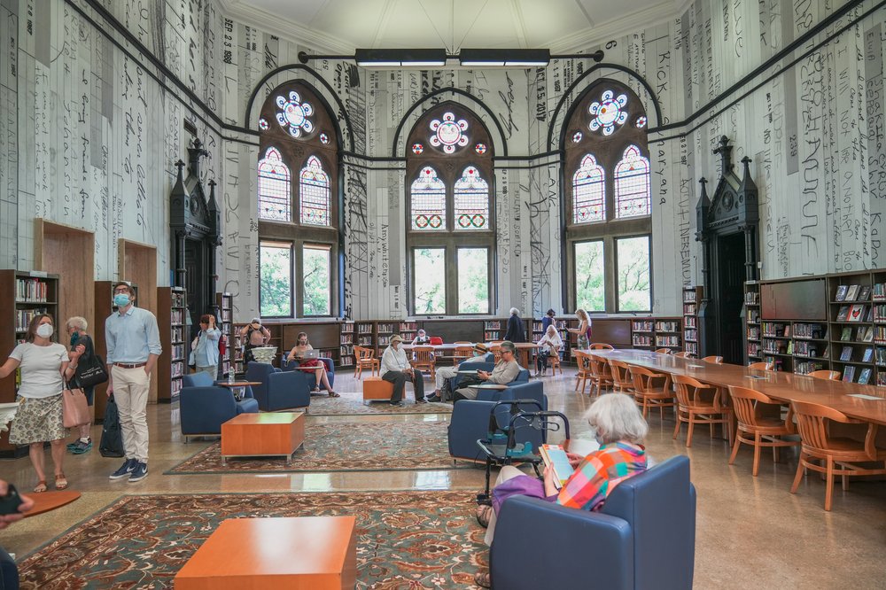 A photo of people reading at the New York Public Library