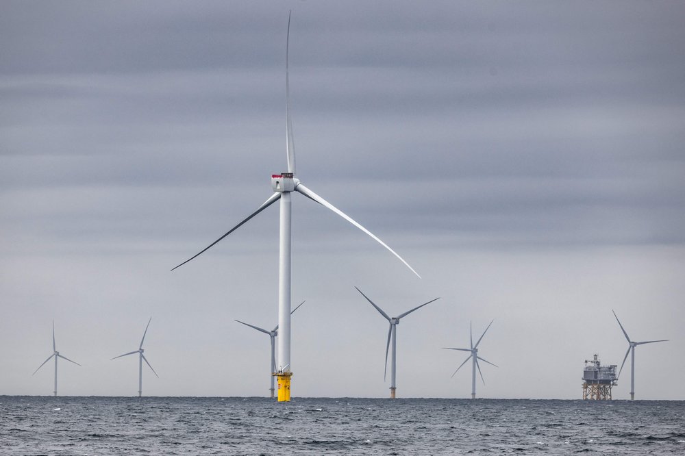 A stock photo of offshore wind turbines