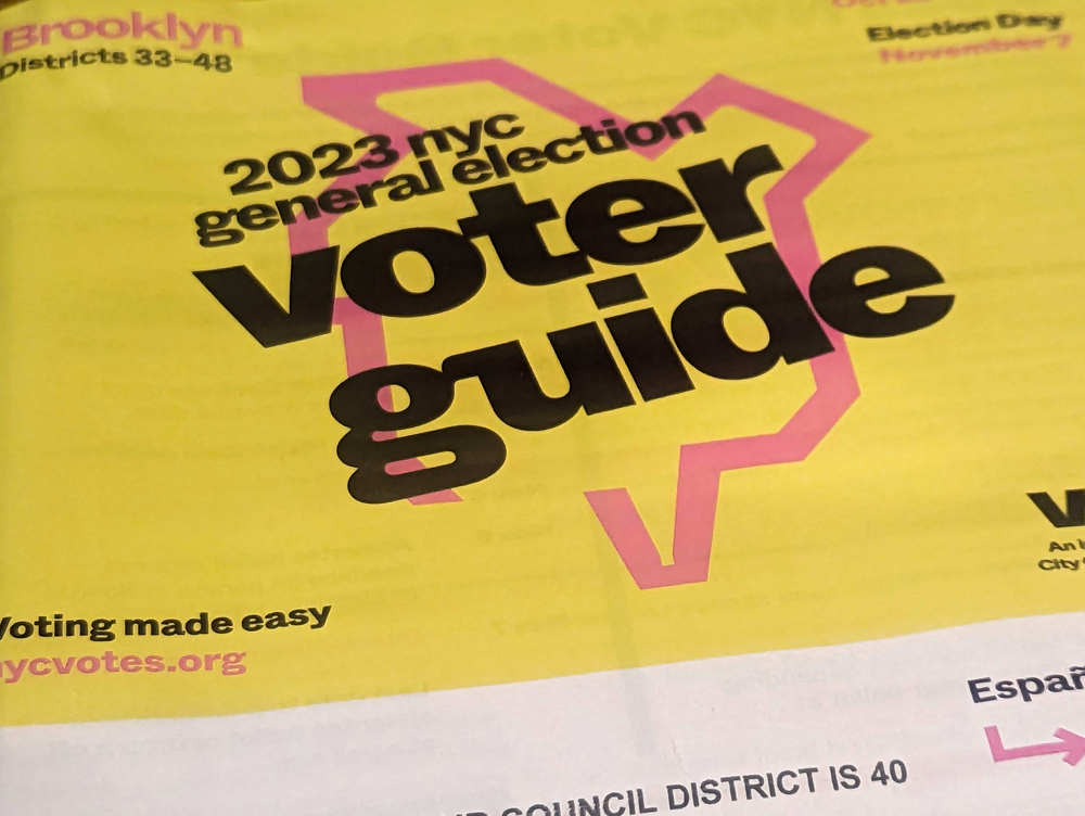 The 2023 Board of Elections voter guide, a yellow packet mailed to households around the city.