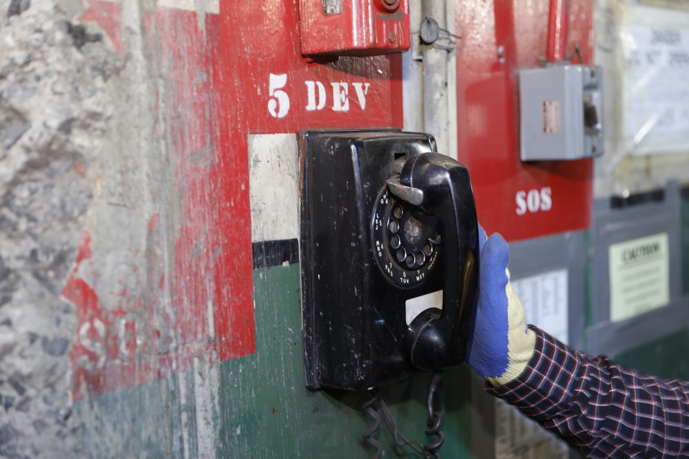 A black rotary phone.