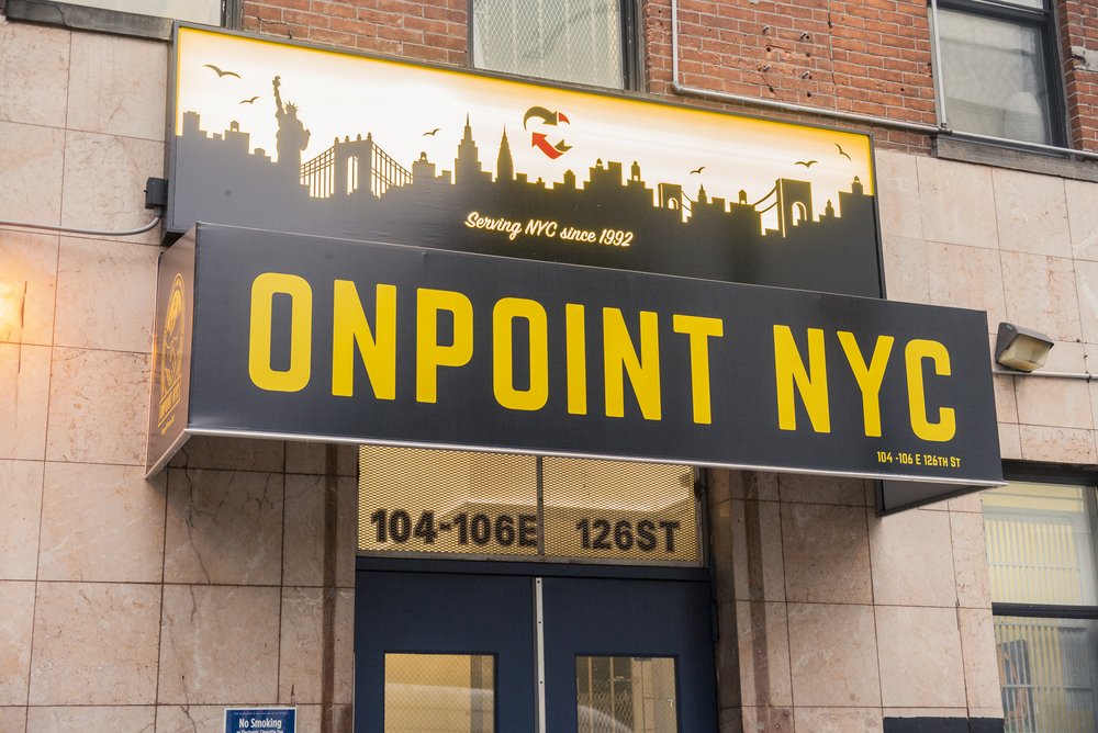 A large awning-front sign that reads: "OnPoint NYC."