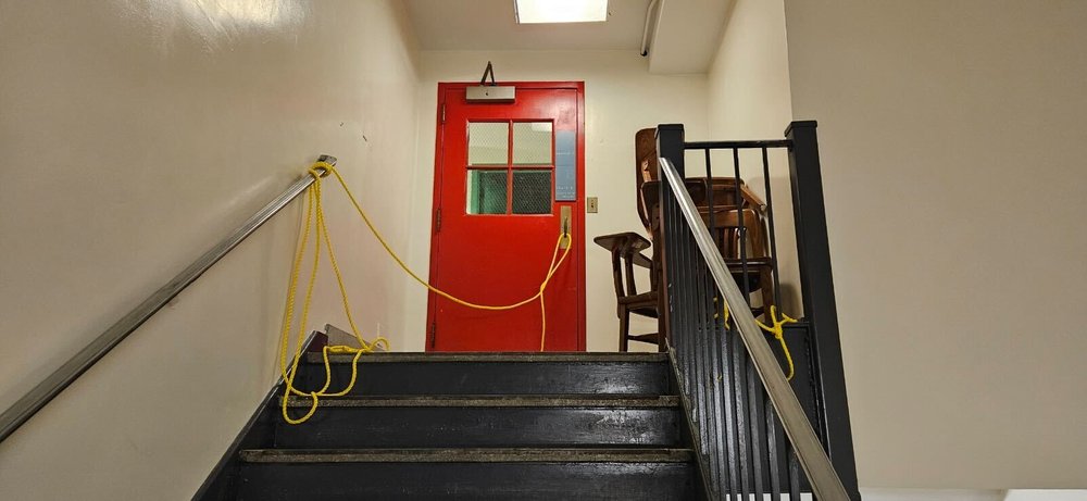 A photo showing a barricaded door with rope at Columbia's Hamilton Hall.