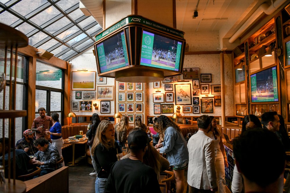 A screen hangs from the ceiling