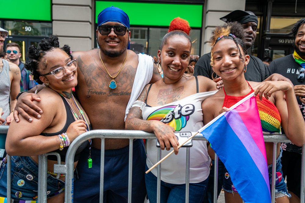 People lining Fifth Avenue for 2023's NYC Pride March.