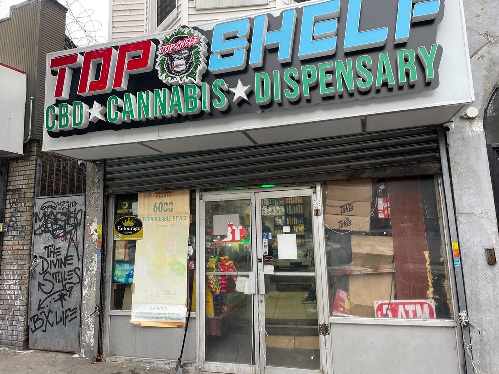 A photo of the smoke shop in the Bronx where a clerk allegedly shot a customer.