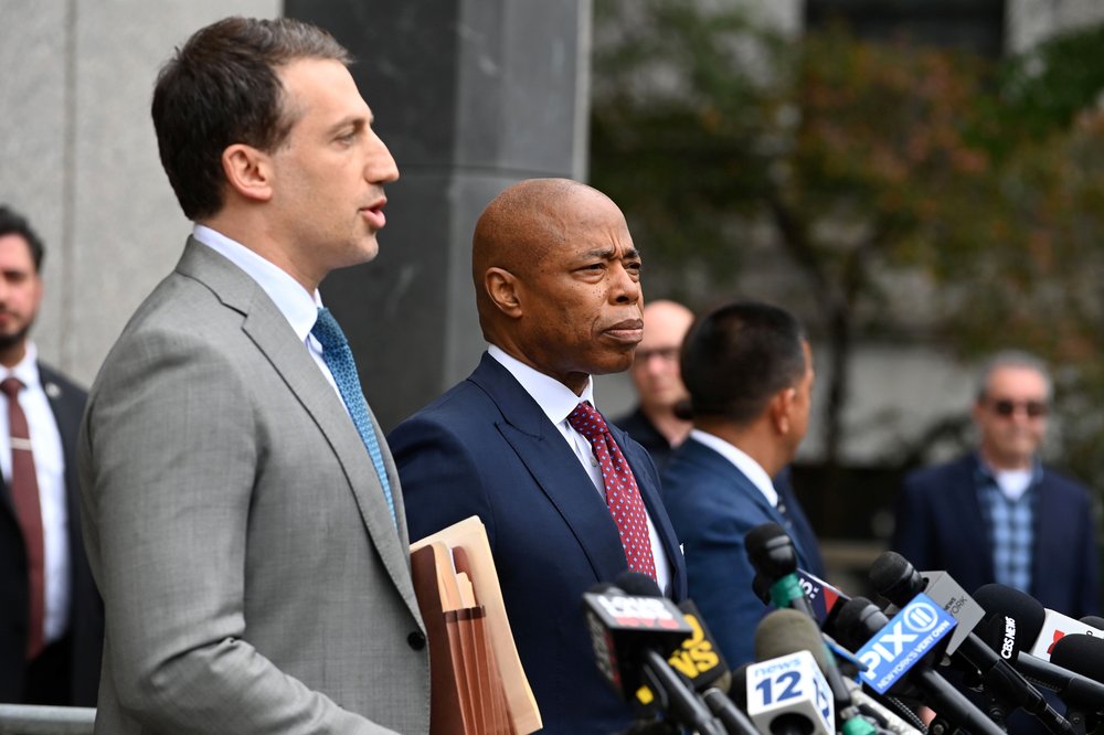 A photo of Alex Spiro and his client Mayor Eric Adams following the mayor's arraignment.