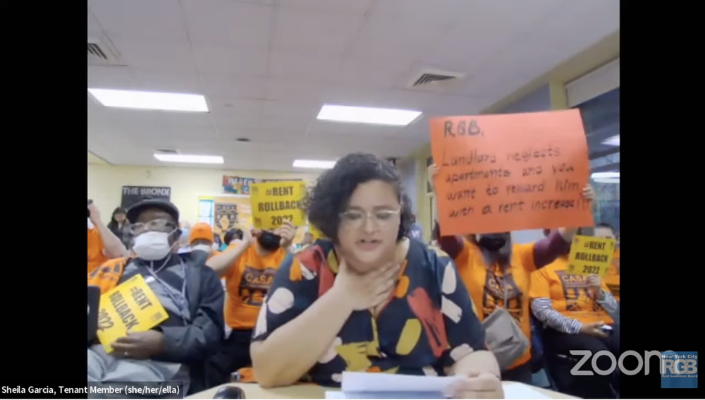 Tenant representative Sheila Garcia delivers testimony before the vote to increase rents.