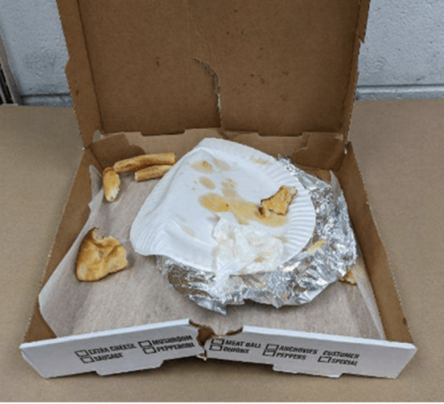 A photo of the discarded pizza box investigators used to identify DNA.