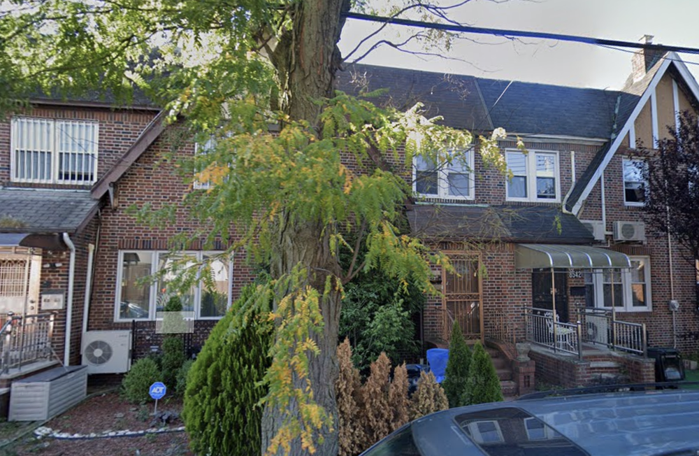 A home in Queens where officials say an elderly woman was killed by a fire.